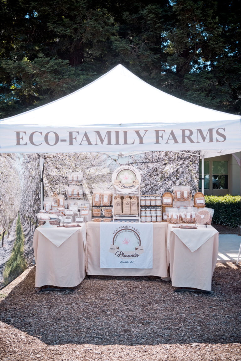 Eco-Family Farms farmers market booth